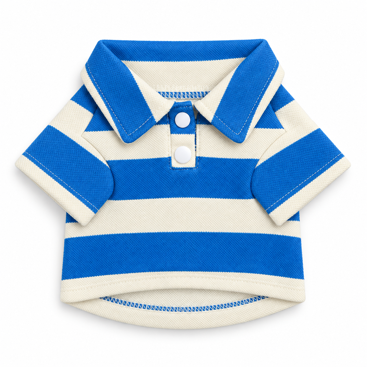 A blue and cream striped dog polo shirt laid flat, with a collar and two press-stud buttons