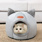 Cat relaxing inside a soft gray cat cave house featuring an enclosed design, plush lining, and cute cat-ear details. Warm indoor pet bed that provides security, comfort, and a private sleeping space for cats and kittens. | Pet Grooming | Pet Supplies and Food Australia | Pet Supplies Sydney | PetNexa Australia | Shop now
