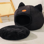 Black enclosed cat cave bed with cat-ear accents and a removable plush cushion, providing a warm, private, and comfortable sleeping space for cats and kittens. | Pet Grooming | Pet Supplies and Food Australia | Pet Supplies Sydney | PetNexa Australia | Shop now
