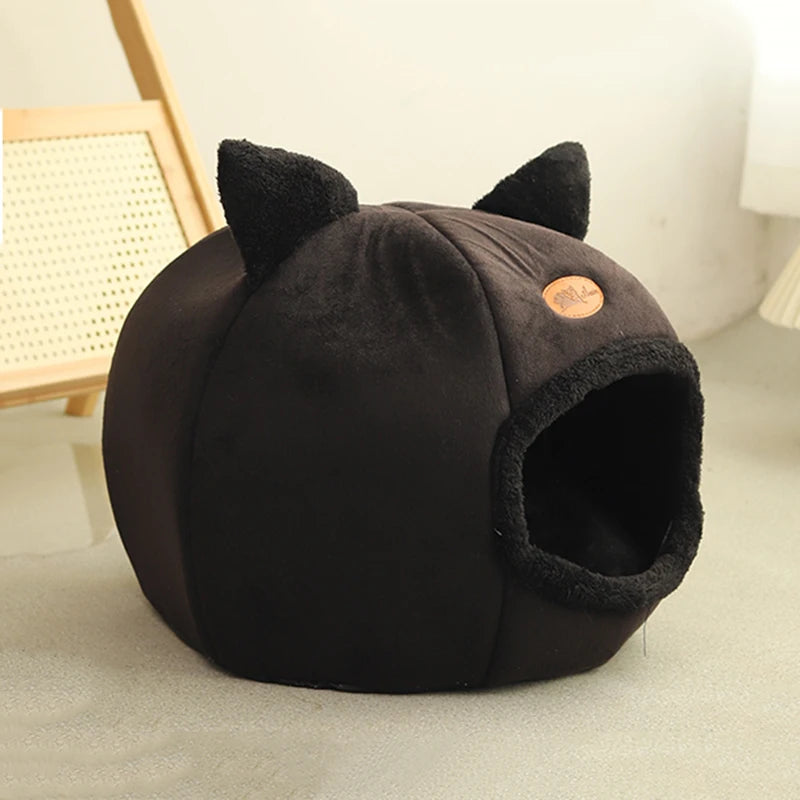 Black enclosed cat cave bed with cat-ear accents and a removable plush cushion, providing a warm, private, and comfortable sleeping space for cats and kittens. | Pet Grooming | Pet Supplies and Food Australia | Pet Supplies Sydney | PetNexa Australia | Shop now