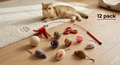 12-pack cat toy assortment featuring a red feather teaser wand, a fidget spinner, assorted play balls, and four plush mice on a wooden floor with a cat. | Pet Grooming | Pet Supplies and Food Australia | Pet Supplies Sydney | PetNexa Australia | Shop now