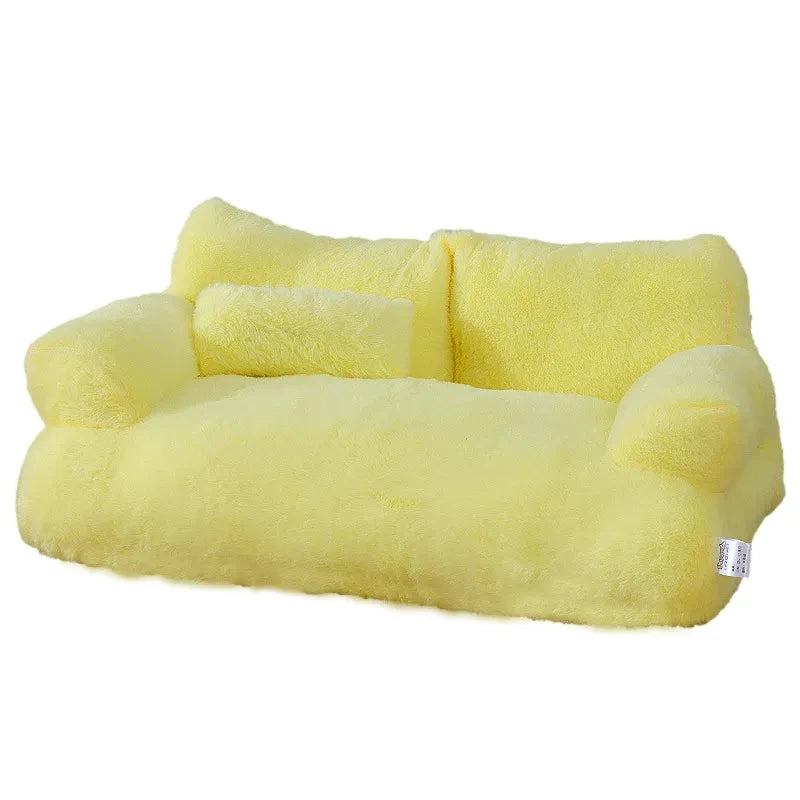 Yellow plush pet sofa bed with bolstered armrests, padded backrest, and matching cushion, designed for cats and small dogs. | Pet Grooming | Pet Supplies and Food Australia | Pet Supplies Sydney | PetNexa Australia | Shop now