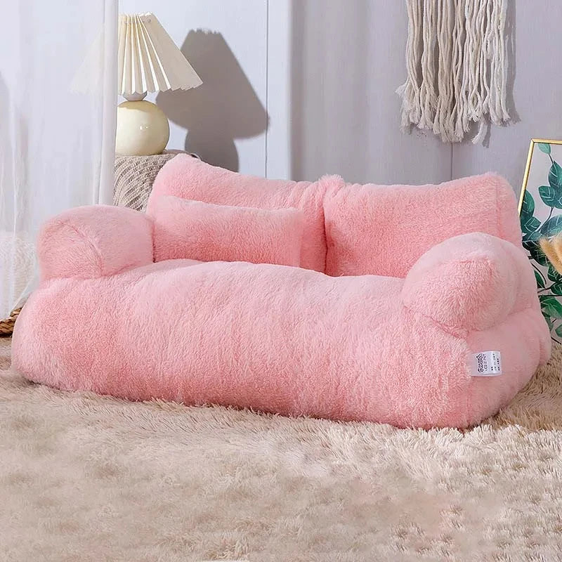 Pink plush pet sofa bed with soft faux fur fabric, raised armrests, and supportive back cushions for cats and small dogs.
 | Pet Grooming | Pet Supplies and Food Australia | Pet Supplies Sydney | PetNexa Australia | Shop now