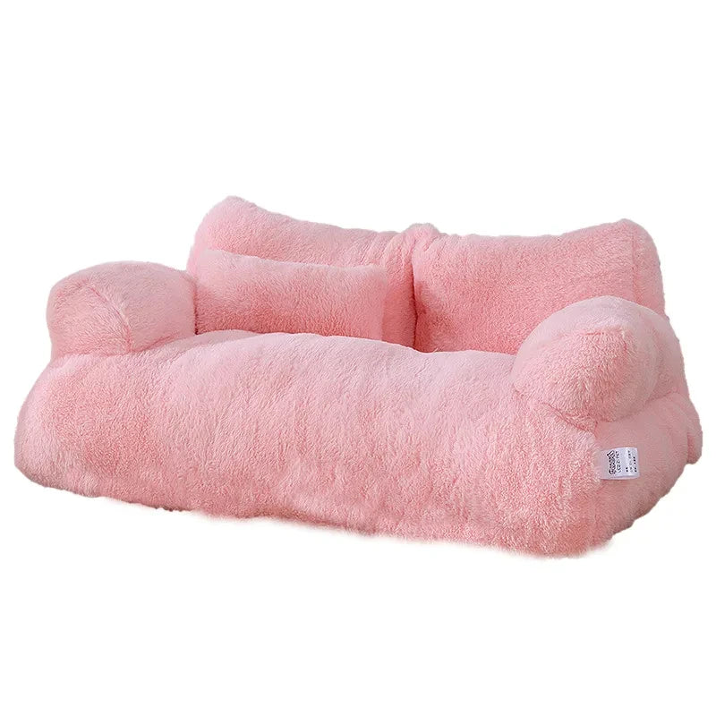 Pink plush pet sofa bed with raised bolstered armrests and a cushioned backrest, designed for cats and small dogs. | Pet Grooming | Pet Supplies and Food Australia | Pet Supplies Sydney | PetNexa Australia | Shop now