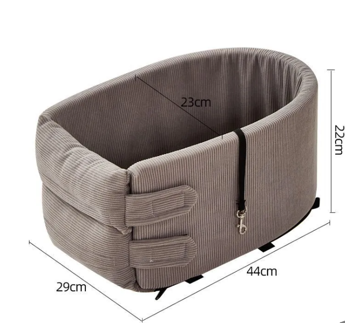 The grey corduroy travel bed with measurement lines: 44 cm long, 29 cm wide, 22 cm high and 23 cm deep inside
